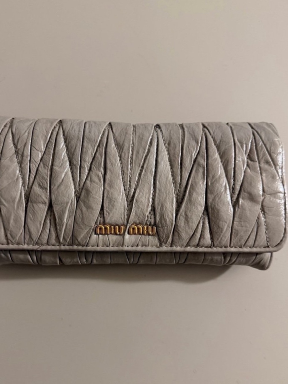 Miu Miu Quilted Leather Continental Wallet in Pale Gray with Gold Logo
